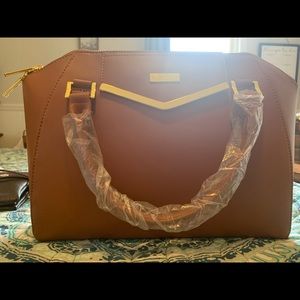 New and never used! Joy and Iman Purse